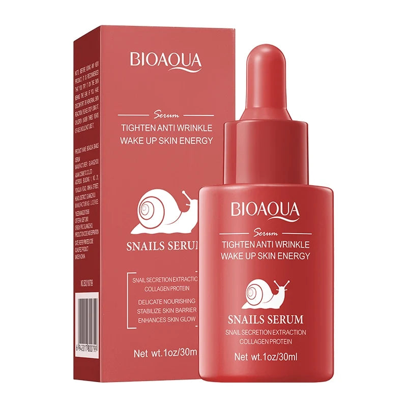 A bottle of BIOAQUA Snails Serum with a red label and a dropper, next to its packaging box which has text and an image of snails.