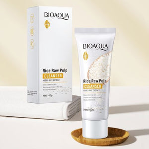 Packaging and tube of BIOAQUA Rice Raw Pulp Skin Whitening Facial Cleanser with a white and yellow color scheme, displaying the product and its benefits.