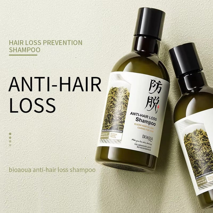 Anti-hair loss shampoo bottle with packaging on a beige background